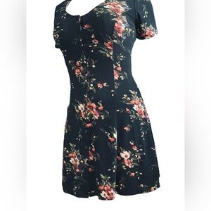 Forever 21 black short sleeved floral print button up front dress.